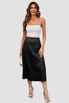 Looking for a stylish and versatile skirt that can be dressed up or down? Look no further than the Black Satin High Rise Midi Skirt! This skirt is perfect for any occasion, from a night out on the town to a casual day at the office. The high waist flatters your figure and the midi length is both stylish and practical. The soft satin fabric is comfortable to wear all day long and the black colour is perfect for any outfit. Pair this skirt with a blouse and heels for a dressy look, or with a t-shi Date Night Long Skirt With Lining, Elegant Spring Skirt For Going Out, Elegant Skirt For Going Out In Spring, Casual Pleated Maxi Skirt For Night Out, Casual Fitted Skirt For Evening Wear, Casual Midi Length Skirt For Night Out, Casual Midi Skirt For Night Out, Casual Midi Skirt For Date Night, Casual Evening Maxi Skirt With Relaxed Fit