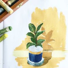 a painting of a potted plant on a table with crayons next to it