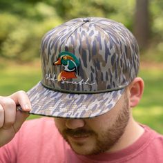 Keeping the hot southern sun out of your eyes and away from your face is important during the heat of June, July and August--both for guys and gals. Our classic, wide-brimmed trucker hat subtly announces your southern roots while shading your head and face. Crown: Structured Pro Crown | Pro-Stitched Finish | Adjustable Snap-Back Visor: Pre-Curved | Curved or Flat - Shape It How You WantSweatband: 3-Part Comfort Cotton FitClosure: Plastic Adjustable Snap-Back Sizes: Adult | One Size Fits Most Casual Upf 50+ Hat Bands For Outdoor, Retro Fitted Hat With Flat Bill For Outdoor, Casual Hat Bands For Summer Outdoor Activities, Casual Uv Protection Hat For Camping, Outdoor Snapback Trucker Hat With Upf 50+, Casual Trucker Hat With Upf 50+ For Outdoor, Retro Trucker Hat With Flat Bill For Outdoor, Green 5-panel Trucker Hat For Beach, Flat Brim Hats With Uv Protection For Outdoor Activities