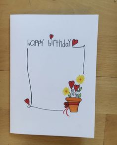 a happy birthday card with flowers in a pot and hearts on the side that says happy birthday