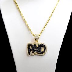 The Pendant Displays Luxurious Quality Iced Out With High Quality Lab Diamonds Despite The Affordable Price And Is Firmly Constructedpendant Size - 1.5 Inchnecklace Size - 30 Inch Length Why Shop With Us? We Provide Premium Quality Hip-Hop Jewelry. Our Products Can’t Be Compared With Other Jewelers. We Are Direct Jewelry Importers. 100% Client Satisfaction Guaranteed. Best Quality You Will Find Anywhere Guaranteed Retail Price - $309.99our Price - $59 Black Personalized Pendant Necklaces, Personalized Black Pendant Necklaces, Black Rope Chain Necklace For Gift, Elegant Black Rope Chain Necklace, Black Jewelry With Gold Chain For Gift, Black Pendant Jewelry With Rope Chain, Personalized Black Necklaces For Anniversary, Client Satisfaction, Charm Chain