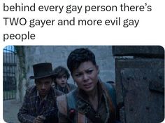 two people standing next to each other with text that reads, behind every person there's two gay and more evil gay people