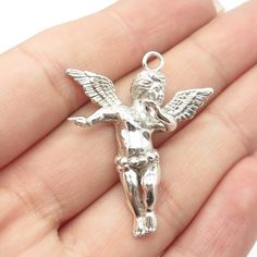 Unfortunately, the bail is missing, but can be easily replaced by your local jeweler.  925 Sterling Silver Vintage Cherub Angel Pendant  Weight: 6.6g   WELCOME TO PAWN SHOP We are an actual pawn shop and have been in business for over 25 years. Since 1990, our establishment has been serving a variety of clients by providing them with short term cash solutions and options of liquidity regarding their treasured heirlooms. Acknowledging that today′s customers are very sophisticated and are looking Sterling Silver White Gold Charms For Jewelry Making, White Gold Sterling Silver Charms For Jewelry Making, Silver Sterling Silver Charms Stamped 925, Silver Pendant Charms For Anniversary, Valentine's Day White Gold Sterling Silver Charms, Silver Charms Stamped 925 For Anniversary, Silver Charms Stamped 925 For Gift, Anniversary Silver Charms Stamped 925, Silver Pendant Charms Stamped 925