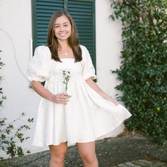 Ready For The Brides Or Graduates. Gorgeous Cream Textured Floral And Satin Baby Doll Style Dress. Empire Waist, Puff Sleeves And Invisible Back Zipper. Model Is Wearing Size Small Puff Sleeves Lined Empire Waist Cream Textured Floral Satin Fabric 100% Polyester Just Add Heels And Head Out To The Party. Flowy Ruffle Dress, Baby Doll Style Dress, Lace Cutout Dress, Kimono Mini Dress, Grad Pic, Dress Empire Waist, Tulle Mini Dress, Midi Dress Formal, Form Fitting Dress