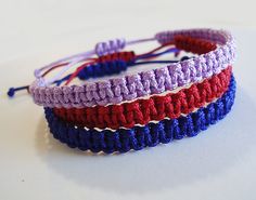 three bracelets with red, white and blue crochet