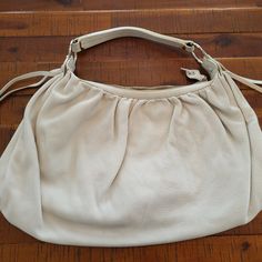 Embossed Leather, Silver Hardware, Side Rings With Fringe. Gently Used, Excellent Condition. Dust Cover. Miu Miu Bag, Leather Hobo Bag, Leather Silver, Leather Hobo, Dust Cover, Silver Hardware, Hobo Bag, Embossed Leather, Miu Miu