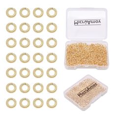 10 pairs of gold plated jump rings in a plastic case with screws and washers