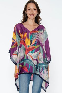 Our Shalini Tops are made with 100% Cupro material, which is a luxurious, sustainable fabric that is produced from repurposed cotton waste in a closed loop system. This elegant caftan top has the look and feel of silk, but the lightness, easy care, and breathability of cotton.  These fair trade tunics come in a range of stunning floral and geometric prints, and are a free size style that is designed for a comfortable and elegant fit up to XXL size. One Size Fits Most, 30" Length Silk V-neck Printed Tops, Rayon V-neck Blouse For Loungewear, V-neck Rayon Blouse For Loungewear, Silk Blouse For Spring Vacation, Multicolor Vacation Tops With Kimono Sleeves, Multicolor Kimono Sleeve Tops For Vacation, Floral Print V-neck Beachwear Top, Chic Silk Beach Blouse, Silk V-neck Top For Vacation