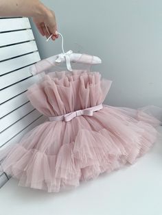 Baby Girl Dusty Pink Dress - Etsy Bulgaria Elegant Pink Tulle Fairy Dress, Pink Tulle Dress With Bow, Elegant Pink Tutu Dress With Tulle Skirt, Elegant Pink Tulle Tutu Dress, Cute Pink Dress With Ruffled Skirt, Pink Bow Dress For Dress-up, Pink Tulle Tutu Dress, Elegant Dress With Pink Bow For Dress-up, Blush Tulle Dress With Ruffles