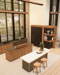 a living room filled with furniture and large windows