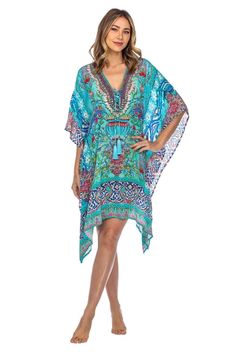 Lightweight Viscose Silk with colorful digital print and decorative rhinestones. Care: Hand wash cold, hang dry, iron from reverse if needed. The perfect La Moda Kaftan Resort Wear top, flowy and super light. It will keep you fresh and looking beautiful in warm weather! Wear it over swimsuit or as regular top. Made with lightweight material, roomy with a relax fit. This caftan top features a deep lace up V neck, generous armholes and fine embellishing.It has an elegant cape like drape. Its uniqu Blue Bohemian Dress For Pool, Blue V-neck Swimwear For Festival, Bohemian Blue One-piece Swimwear, Summer Party Kaftan In Free Size, Summer Party Kaftan, Free Size, Multicolor V-neck Party Swimwear, Multicolor V-neck Swimwear For Festival, Multicolor V-neck Swimwear For Party, Fitted V-neck Kaftan For Festivals