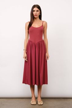 Drop-waist midi dress with a micro-ribbed cami bodice and nylon skirt. Adjustable straps. Lined. Ribbed top: 97% cotton, 3% spandex Skirt: 100% nylon // Lining: 100% cotton Made in China Measurements: 49" length (adjustable straps) Small: 14.5" across chest Medium: 15" across chest Large: 15.5" across chest Model: 5'9" wearing size Small Sheet Dress, Nylon Skirt, Ribbed Midi Dress, Dress Hats, Ribbed Top, Cotton Skirt, Short Jumpsuit, Black Midi Dress, Drop Waist