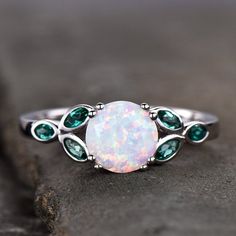 Hey, I found this really awesome Etsy listing at https://www.etsy.com/listing/621161008/opal-ringopal-and-emerald-engagement Opal Wedding Ring Set, Birthstone Band, Birthstone Promise Rings, Vintage Opal Engagement Ring, Opal Wedding Band, White Opal Ring, Sterling Silver Promise Rings, Opal Wedding Rings, Ring Opal