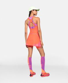 Technical Compressive Activewear, Compressive Technical Activewear, Sporty Fitted Tennis Dress For Training, Spring Fitted Running Activewear, Pink Spring Tennis Dress For Sports, Pink Tennis Dress For Spring Sports, Sporty Spring Gym Dresses, Pink Tennis Dress For Spring, Pink Athleisure Tennis Dress