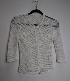 "a vintage white crochet knit blouse with cropped sleeves ✿ IMPORTANT INFORMATION: * excellent vintage condition * size: extra-small - please check exact measurements below (they're there for your benefit!) ✿ MEASUREMENTS (taken while item is lying flat, some measurements will need to be doubled): * shoulder to shoulder: 15\" (38cm) * armpit to armpit: 16\" (41cm) * length (centre of back neckline to bottom): 20\" (51cm) * sleeves (shoulder to cuff): 17\" (43cm) ✿ free UK shipping on orders over Fitted Crochet Top With Crochet Trim For Winter, White Bohemian Sweater With Crochet Trim, Fitted Crochet Trim Top For Winter, Vintage Fitted Open Knit Crochet Top, Vintage White Knitted Tops, White Vintage Knitted Top, White Pointelle Knit Crochet Top For Winter, White Crochet Lace Top For Winter, White Hand Knitted Crochet Top For Spring