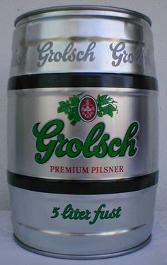 a can of grolsch beer sitting on top of a table