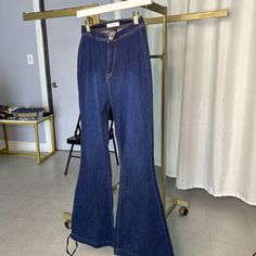 Denim Stretchy Fits Average Tall Person Has Tie String On Bottom Fits Nicely In Good Condition Never Worn High Rise Stretch Denim Jumpsuit, Dark Wash Full-length Denim Jumpsuit, High Rise Dark Wash Flare Jeans For Summer, High Waist Stretch Denim Jumpsuit, Fitted High Waist Denim Flare Jeans, Stretch High-waisted Denim Jumpsuit, Stretch Denim Blue Denim Jumpsuit, Stretch Denim Blue Jumpsuit, Non-stretch High Waist Dark Wash Denim Jumpsuit