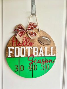 a wooden sign that says football season 30 - 40 on the side of a door