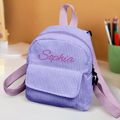 This unique backpack comes with their name beautifully embroidered, making it truly one-of-a-kind. With this feature, your child will easily stand out in a crowd, making it easier to keep track of their belongings. Give the gift of personalization and convenience with our Personalized Backpack.
Roomy Compartment - Cute backpack to store your kids snacks and items.
Material: Corduroy
Size:
Width - 19cm/7.48inch;
Height - 16.5cm/6.49inch;
Thickness - 11cm/4.3inch Back To School Gifts For Kids, Corduroy Backpack, Personalized Backpack Kids, Unique Backpacks, Personalized Backpack, Embroidered Name, Back To School Gift, Kids Backpack, Cute Backpacks