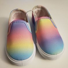 Rainbow Show Slip On Sneakers Size 5 New Playful Multicolor Spring Sneakers, Multicolor Non-slip Sneakers For Spring, Spring Multicolor Non-slip Sneakers, Multicolor Non-slip Slip-on Sneakers, Pink Canvas Shoes With Round Toe For Summer, Pink Sneakers For Summer Playtime, Pink Slip-on Sneakers For Playtime, Multicolor Sneakers For School In Spring, Pink Canvas Shoes With Rubber Sole And Round Toe