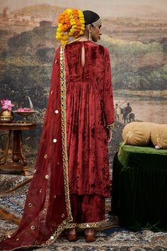 Red velvet kurta featuring zari embroidered bodice, embellished with ghunghroo and mirrorwork. Comes with pant and kiran lace lined dupatta. - Aza Fashions Red Embellished Chanderi Traditional Wear, Red Embellished Chanderi Dupatta, Red Embellished Straight Kurta, Red Embellished Kurta, Designer Red Embellished Kurta, Red Embellished Kurta For Festive Occasions, Red Embellished Festive Kurta, Red Embellished Salwar Kameez For Navratri, Red Embellished Kurta For Festivals