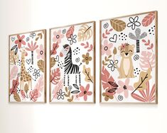 three paintings on the wall with animals and flowers in them, one has a giraffe