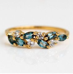 This is Stfoliverjewelry. I am a specialist in making jewelry in artistic designs. If you want me to prepare rings set of your thoughts, share your vision and I'll shape that vision to reality. SKU Number - N/A Material - 14K/18K Solid Gold Gemstone - AAA+ Natural London Blue Topaz Gemstone Gemstone Shape - Marquise Gemstone Size - 5x2.50mm Gemstone Weight - 0.14ct Natural white Moissanite accents Metal stamp - 14K /18K Occasions - Engagement , wedding , birthday , anniversary etc. Local Eclectic, Natural Gemstone Ring, London Blue Topaz Ring, Vermeil Jewelry, Blue Topaz Ring, London Blue Topaz, Topaz Gemstone, London Blue, Rings For Her