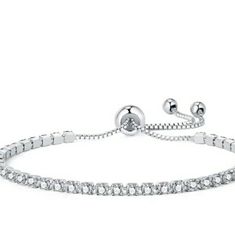 Coming Soon To My Closet. Please Like To Get Discount Notifications. Elegant, Subtle And Regal, This Cz Tennis Bracelet Is A Great Piece To Add To Your Collection. Perfect For Pulling Together A Semi-Casual Outfit Or When You Want To Pair It With Other Pieces For A Night Out. It Will Illuminate Your Look Whenever You Need To, Adding Twinkle And Elegance To Any Outfit. This Radiant And Glimmering Bracelet Makes For A Great Gift. Adjustable Crystal Tennis Bracelet, Adjustable Silver Diamond Bracelet With Prong Setting, Adjustable Dazzling Tennis Bracelet For Anniversary, Adjustable Sterling Silver Tennis Bracelet In Diamond White, Luxury Adjustable Crystal Bracelet With Sparkling Stones, Hand Set White Gold Crystal Bracelets, Luxury Adjustable Crystal Diamond Bracelet, Luxury Adjustable Crystal Bracelet, Adjustable Cubic Zirconia Bracelet With Sparkling Stones