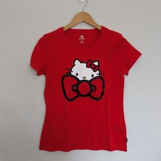 Brand New Never Worn Hello Kitty X Converse Collab Red Tshirt Size Small Women’s Red Cotton Hello Kitty T-shirt, Converse Graphic Print Short Sleeve T-shirt, Red Hello Kitty Print Crew Neck Top, Red Hello Kitty Short Sleeve Tops, Red Crew Neck Top With Hello Kitty Print, Casual Red Hello Kitty Top, Converse Cotton Graphic Tee, Converse Graphic Tee Cotton Top, Red Hello Kitty Cotton T-shirt