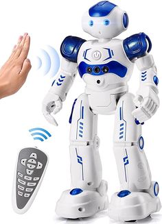 a white robot with blue accents next to a hand