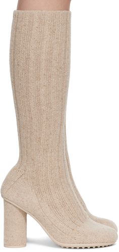 Mid-calf rib knit wool- and silk-blend boots in beige. · Covered block heel with rubber injection · Treaded bio-based rubber sole · Heel: H3.5 Supplier color: Dune melange Luxury Mid-calf Boots For Fall, Beige Mid-calf Heeled Boots For Fall, Winter Beige Mid-calf Boots With Reinforced Heel, Wool Ankle Boots For Fall, Beige Heeled Boots With Reinforced Heel For Winter, Winter Beige Heeled Boots With Reinforced Heel, Luxury Beige Boots For Fall, Luxury Beige Winter Boots, Fitted Wool Boots For Fall