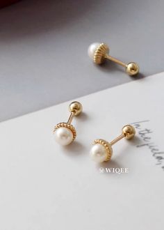 🍃--Details-- Handmade item Materials: Solid Gold (no gold filled or gold plated) Gold Kt: 10K Gemstone: Freshwater Pearl Gem colour:white Style: Minimalist & Modern & Classic Made to Order 🍃--Description-- ❤️All components of the Earrings are genuine 14ct Gold. ❤️10K Solid Gold Natural Freshwater Pearl Tiny Stud Earrings, 10K Real Gold Pearl ball end piercing, Cartilage Helix 2nd/3rd earlobe Piercings 🍃Ring Features  ✪ 10k Solid Gold  (no gold filled or gold plated) ✪ AAA Grade Natural Freshwater Pearl ✪ Pearl Size :3.8*3.8mm ✪ Earring size : 4.8*4.8mm ✪ Thickness: 0.8 mm ✪ Gold Colour : Yellow Gold ✪ Made to Order  --Others Information--  🔧Making:  WIQEE Jewels' pieces made to order. Please allow 4 - 8 business days for manufacturing. Need it sooner? Just ask and we will let you know Classic Dangle Cartilage Earrings, Classic White Hypoallergenic Cartilage Earrings, Classic White Cartilage Earrings As Gift, White Hypoallergenic Round Cartilage Earrings, Hypoallergenic White Cartilage Earrings, Elegant Round Screw Back Piercings, Elegant Round Piercings With Screw Back, Classic White Round Piercings, White Hypoallergenic Cartilage Earrings For Anniversary