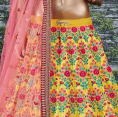 Allure the crown in this yellow wedding sabyasachi designer lehenga is made of Mulberry Silk fabric that has been enhanced with lovely heavy floral embroidery all over with stone embellishments.
The lehenga having heavy zari, sequins and cording embroidered border at bottom part which makes this outfit perfect for any occasion.
It Comes along with unstitched pink Mulberry Silk pink blouse piece similar work and laced soft netted Orange colored dupatta to complete the look. Fitted Yellow Art Silk Embroidered Fabric, Fitted Yellow Embroidered Art Silk Fabric, Yellow Anarkali Embroidered Art Silk Fabric, Yellow Anarkali Art Silk Embroidered Fabric, Fitted Yellow Embroidered Fabric For Eid, Semi-stitched Yellow Anarkali Set With Floral Embroidery, Yellow Semi-stitched Anarkali Set With Floral Embroidery, Semi-stitched Yellow Lehenga With Intricate Embroidery, Gold Art Silk Lehenga With Floral Embroidery