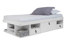 a white bed with drawers underneath it and a pillow on the headboard, in front of a white background