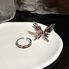 ✨ Red Butterfly Ring Set - Embrace Transformation �✨ The Red Butterfly Ring Set is more than just a set of rings; it's a symbol of transformation and change. Like a butterfly emerging from its cocoon, these rings represent your ability to embrace new beginnings. 🦋 Butterfly Transformation: The Red Butterfly Ring Set features beautifully designed rings with butterfly motifs that symbolize change and growth. Its intricate design captures the essence of transformation, adding a touch of grace to yo Butterfly Transformation, Insect Ring, Butterfly Rings, Index Finger Rings, Punk Vintage, Red Butterfly, Stylish Rings, Butterfly Ring, Luxury Rings