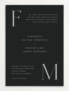 a black and white wedding card with the letter f on it's front side