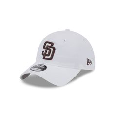 The San Diego Padres White 9TWENTY Adjustable Cap features an embroidered Padres logo at the front panels with a matching woven team logo tag at the adjustable D-Ring closure at the rear. Casual Baseball Cap With Logo Detail, Sports Hats With Logo And Curved Bill, White Sports Hat For Baseball Season, Sports Hat With Logo And Curved Bill, White Hats For Baseball Season, Collegiate White Visor Hat, White Collegiate Visor Hat, Casual Cap With Logo Detail, Collegiate White Baseball Cap