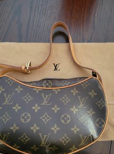 Louis Vuitton Croissant Shoulder Bag MM Brown Monogram Canvas. Purchased Paris France in 2005. Gently used. Louis Vuitton Croissant Bag, Monogram Canvas, Bags Handbags, Bag Lady, Shoe Accessories, Louis Vuitton, Women Accessories, Monogram, Handbags