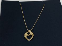 "Description: A Beautiful Sterling Silver Mother-Child Necklace. Pendant & Chain are made of Gold Plated Solid 925 Sterling Silver, both are stamped with 925 for Authenticity. Mother's Day is just around the corner and it's time to find the perfect gift for all the wonderful Moms in your life. Gift her a heart shaped pendant which is a true classic, highlighting a mother (mom) and Childs unique bond. Crafted from sleek 925 sterling silver with Gold Plating. This pendant is both of unsurpasse Gold Heart-shaped Jewelry Stamped 925, Gold Heart Jewelry Stamped 925, Mother's Day Heart Pendant Necklace Stamped 925, Stamped 925 Open Heart Jewelry For Mother's Day, Heart Shaped Pendant, Mother Child, Kids Necklace, Heart Shape Pendant, Mother And Child