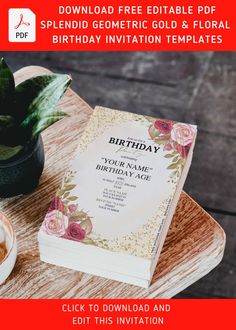 a birthday party with flowers on the table and a potted plant next to it