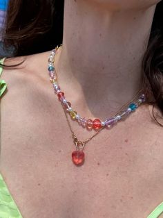 The perfect summer accessory- necklaces with the cutest rainbow beads!! Adds some fun and color to every outfit and is THE necklace of the summer!! Approx. Length 16.5+2" Add another necklace! Fruity Charm Necklace https://www.aspynandivy.com/products/fruit-charm-necklace?_pos=2&_sid=52fe803c9&_ss=r Trendy Heart Beads Charm Necklaces For Jewelry Making, Trendy Heart Beads Charm Necklace For Jewelry Making, Trendy Colorful Necklace With Tiny Beads, Trendy Charm Necklaces For Jewelry Making, Rainbow Necklaces With Heart-shaped Beads, Heart Shaped Necklaces For Summer Gifts, Heart-shaped Summer Necklaces Perfect As Gifts, Trendy Crystal Necklace With Beaded Chain, Cute Pink Summer Necklaces