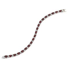 Colleen Lopez Gemstone and White Zircon Tennis Bracelet A testament to timeless elegance and refined taste, this sterling silver tennis bracelet sparkles with oval-cut gemstones and round white zircon.       S/M approx. 6-3/4"L x 1/8"W     M/L approx. 7-1/2"L x 1/8"W     Stamped .925 sterling silver; rhodium plating     Box clasp with double safety catches   Stone Information       All sizes and weights approximate     Total Carat Weight: 12ct (S/M Blue Topaz), 12.8ct (S/M Garnet), 13.2ct (M/L Blue Topaz) or 14.08ct (M/L Garnet)     Garnet - Oval     Blue Topaz - Oval     White Zircon - Round Silver Tennis Bracelet, Box Clasp, Blue Bracelet, Tennis Bracelet, Oval Cut, Blue Topaz, Garnet, Topaz, Timeless Elegance