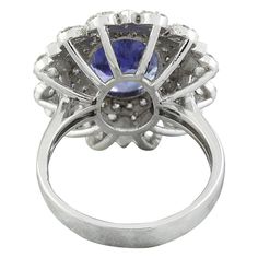 Stamped: 14K Total Ring Weight: 7.1 Grams Tanzanite Weight 6.00 Carat (12.00x9.60 Millimeters)Diamond Weight: 1.00 carat (F-G Color, VS2-SI1 Clarity )Face Measures: 22.55x19.95 Millimeter SKU: [600533] Formal Cluster Sapphire Ring With Vvs Clarity, Formal Vvs Clarity Cluster Sapphire Ring, Formal Vvs Clarity Pear-shaped Sapphire Ring, Formal Pear-shaped Sapphire Ring With Vvs Clarity, Tanzanite Brilliant Cut Formal Rings, Formal Gia Certified Pear-shaped Rings, Formal Gia Certified Cluster Ring, Classic Tanzanite Gemstones For Anniversary, Formal Tanzanite Round Cut Diamond Ring