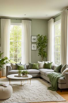 a living room filled with lots of furniture and plants on the windows sill in front of two large windows