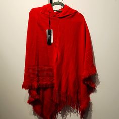 Red, Asymmetric, Detailed, Hooded Pancho. One Size Red One-size Poncho Cape, Red One-size Cape Poncho, Red One Size Cape Poncho, Oversized Red Poncho Cape, Red Oversized Poncho, Red Long Sleeve Poncho, One Size, Red Oversized Poncho For Winter, Oversized Red Poncho For Winter, Red Winter Cape One Size