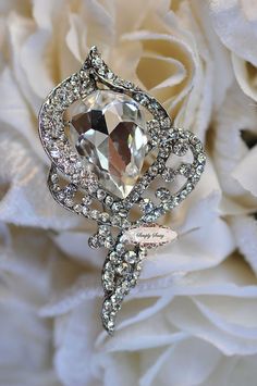 Hey, I found this really awesome Etsy listing at https://www.etsy.com/listing/174754895/rhinestone-brooch-embellishment-flatback Wedding Bouquet Photo Charm, Wedding Boutonnieres, Bouquet Jewelry, Brooch Diy, Bling Wedding, Brooch Bouquet, Photo Charms, Gay Wedding, Wedding Bridal Jewellery