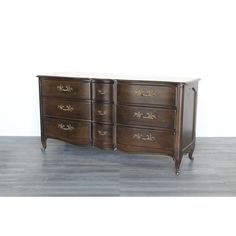 an antique style dresser with marble top