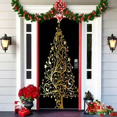 a decorated christmas tree is on the front door