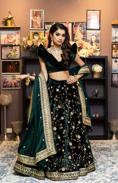 Dark Green Color Silk Velvet Lehenga Set – Panache Haute Couture Party Velvet Sets With Sheer Dupatta, Velvet Party Sets With Traditional Drape, Elegant Velvet Choli With Traditional Drape, Party Wear Lehenga With Dabka For Festive Occasions, Elegant Velvet Reception Sets, Festive Velvet Lehenga With Sheer Dupatta, Elegant Velvet Saree For Party, Elegant Velvet Choli For Diwali, Elegant Velvet Set With Sheer Dupatta