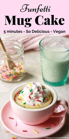 a pink plate topped with a cup filled with cake